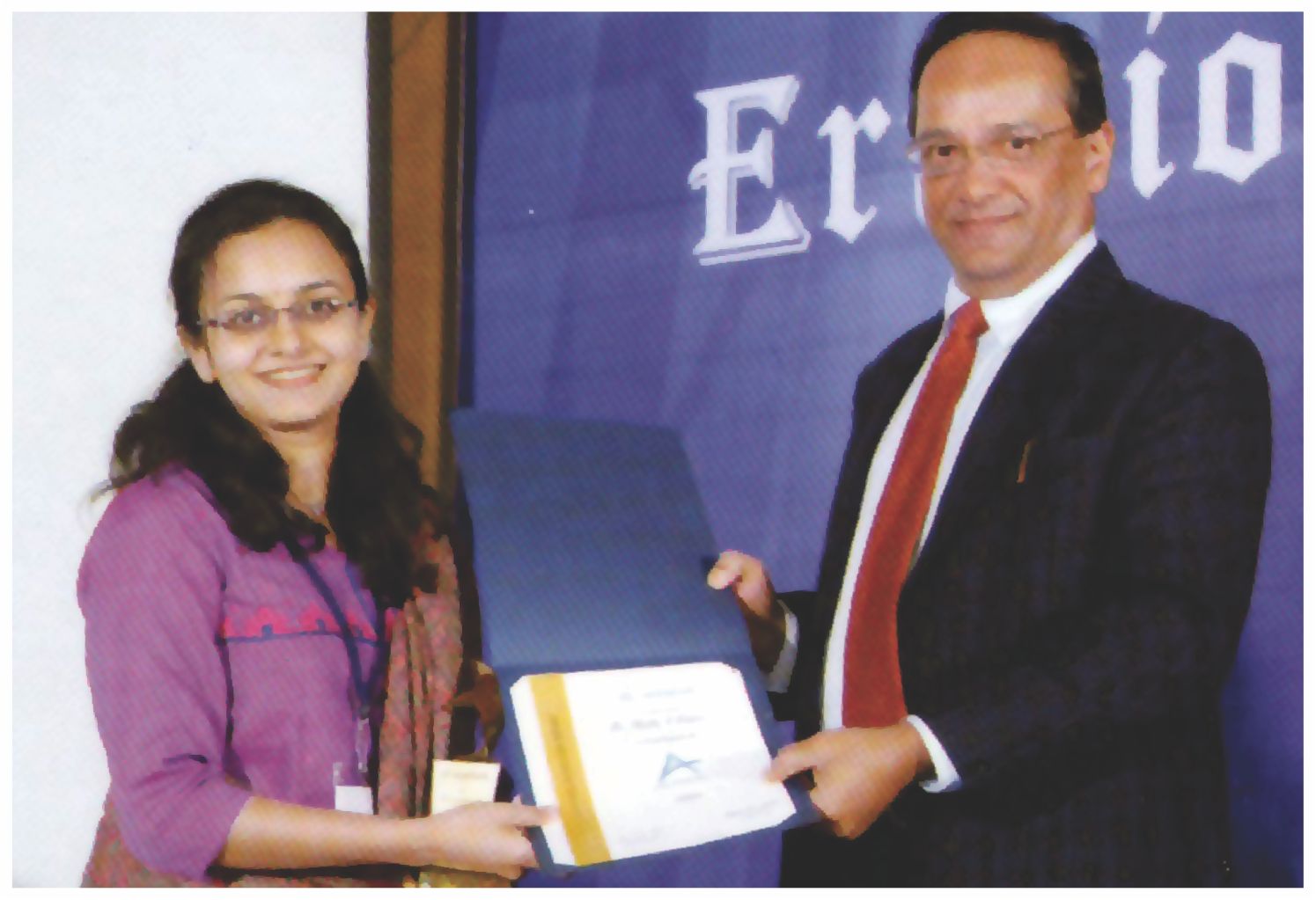 Dr.Shrutika receiving award